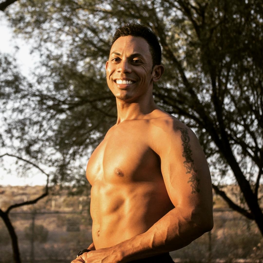 Chris Workman, American Ninja Warrior and mindset coach, outdoors at golden hour